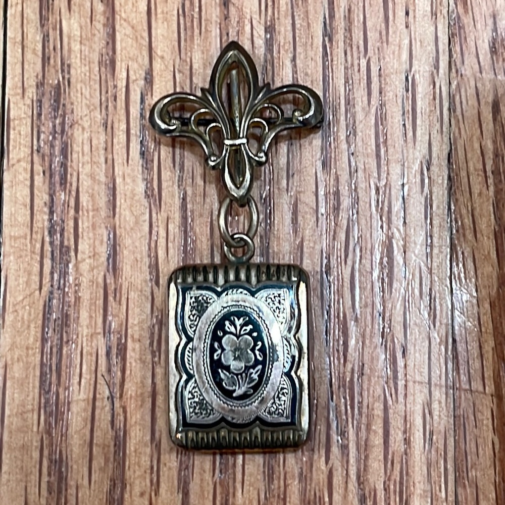 Unique antique locket pin